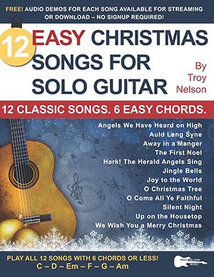 a 12 Easy Christmas Songs for Solo Guitar + CD